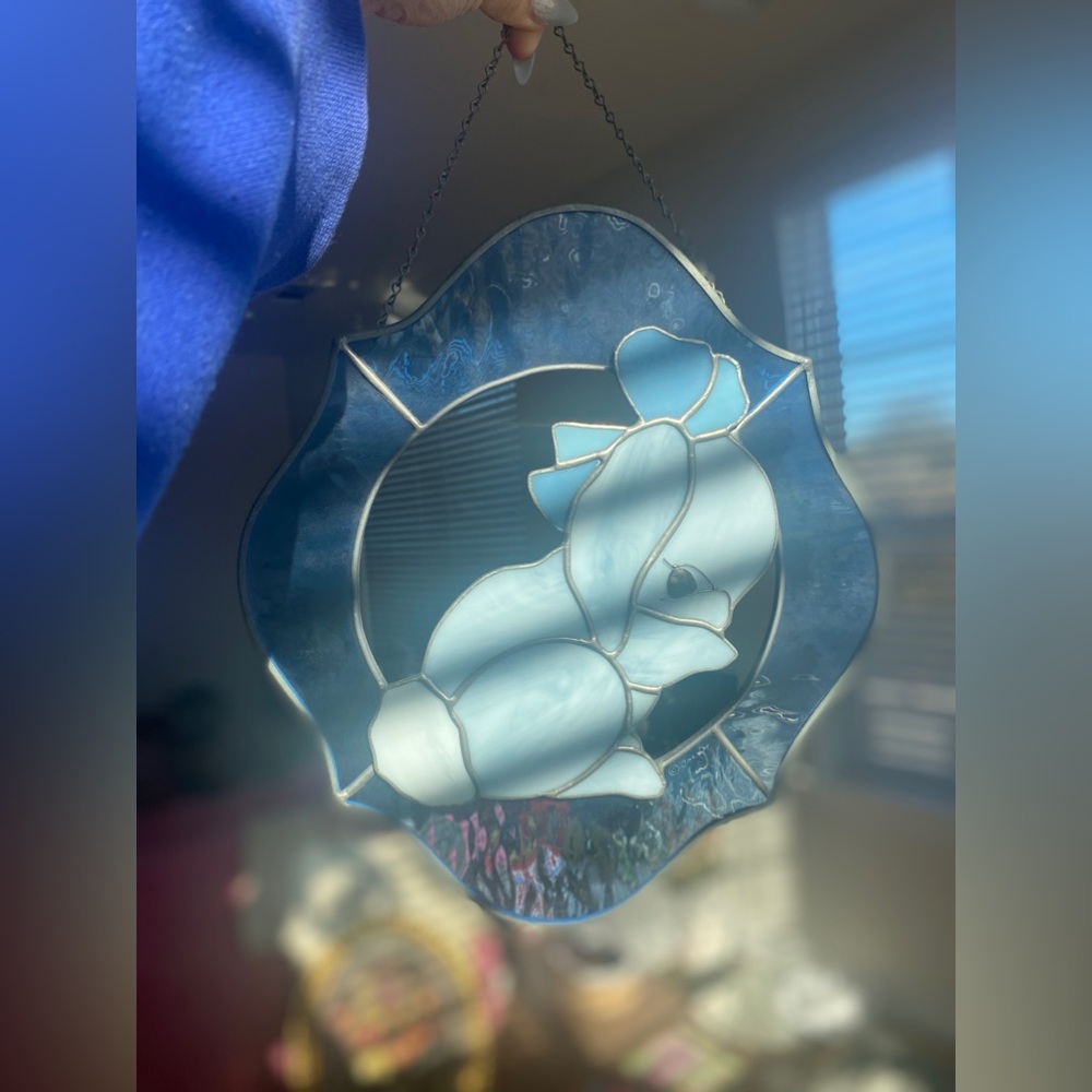 Blue bunny in a bow hanging stained glass